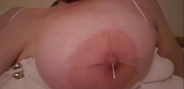 Enjoying the pleasure and pain of twisting two needles inserted through my nipple